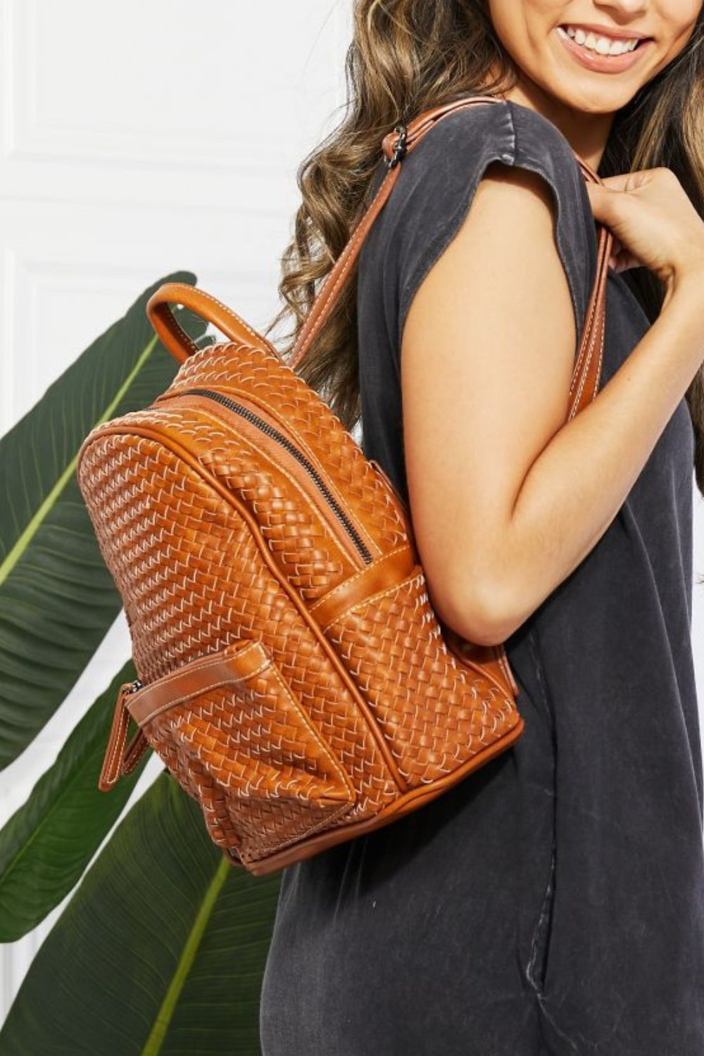 Certainly Chic Faux Leather Woven Backpack